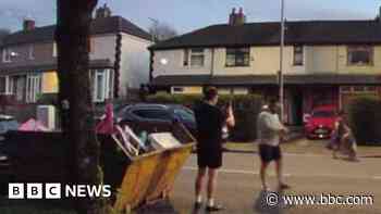 Doorcam catches man dumping rubbish in skip