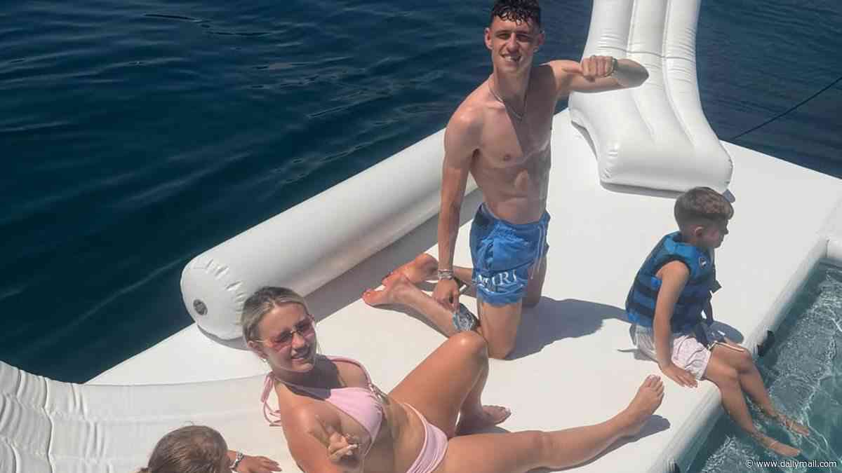 Phil Foden and his girlfriend Rebecca Cooke look loved-up as they enjoy the watersports on family holiday - after World Cup snub