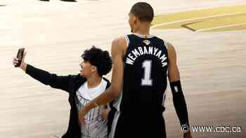 NBA bans pair of fans for life after one attempted on-court selfie with Wembanyama during Game 1