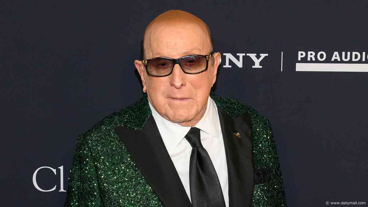 Clive Davis, 94, is discharged from hospital after spending week there following health scare