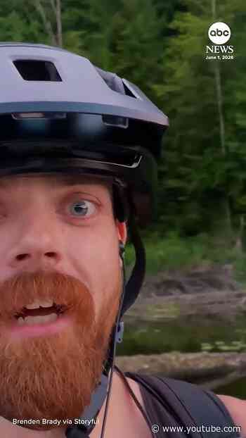 Cyclist has close encounter with bear crossing pedestrian bridge