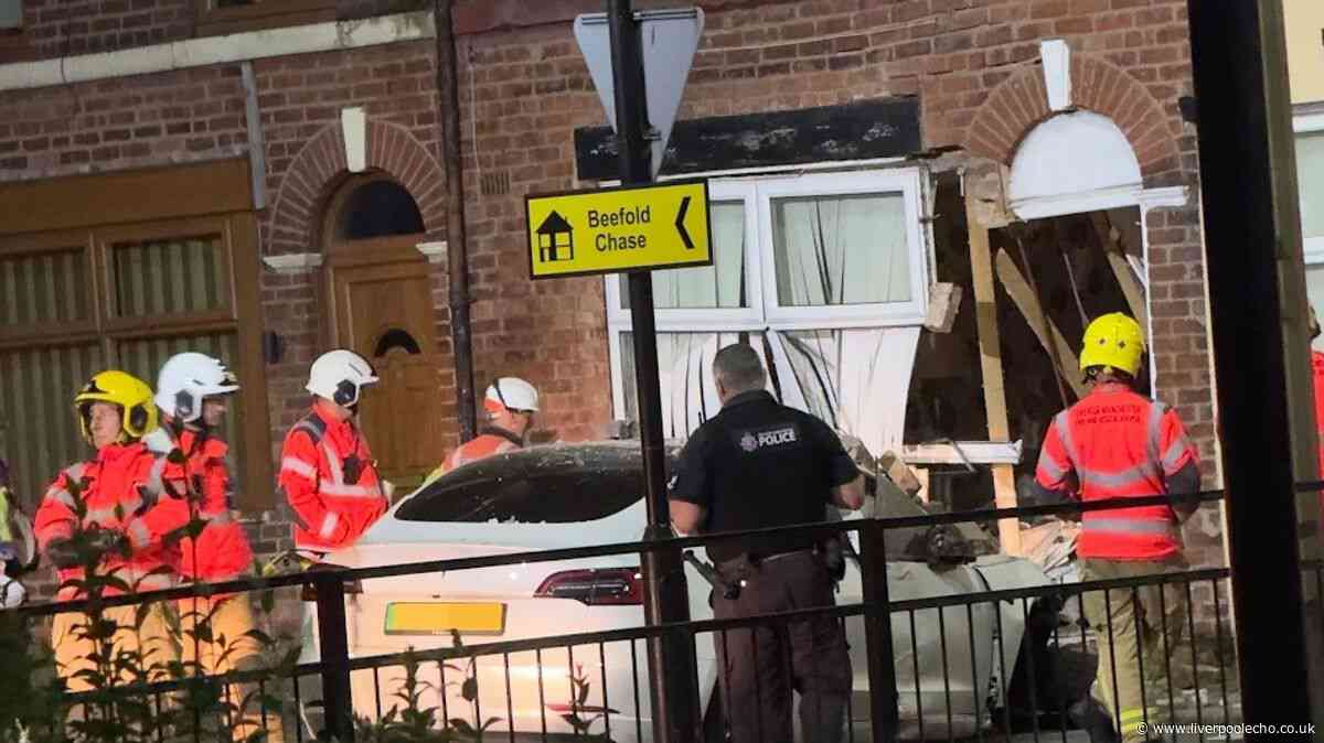 Tesla smashes into house in late night Wigan crash