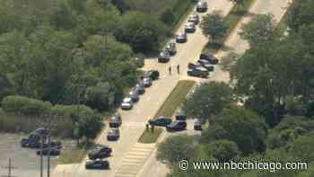 Manhunt continues after fatal shooting at automotive paint shop in suburban Lansing