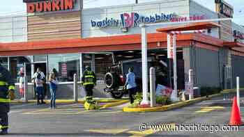 Vehicle crashes into Dunkin' near prominent suburban shopping center