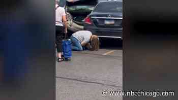 Pedestrian somehow avoids serious injury after being hit by driver in parking lot