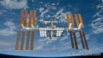 Astronauts on International Space Station take shelter in SpaceX Dragon as cosmonauts try to fix air leak