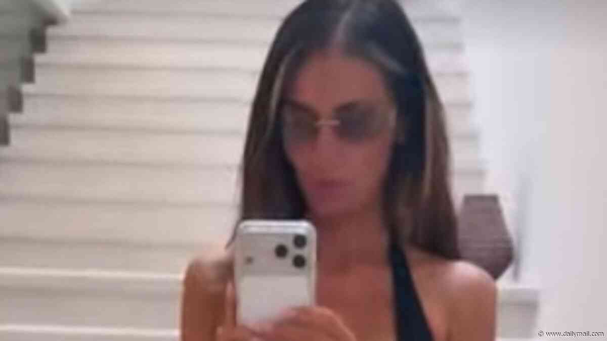 Amy Childs slips into a cut-out black swimsuit for TOWIE filming in Albania after revealing the reason behind her dramatic weight loss