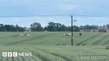 Two injured as small plane crashes in field