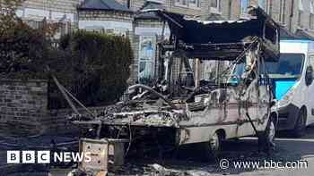 Arson arrest after campervan explodes in street