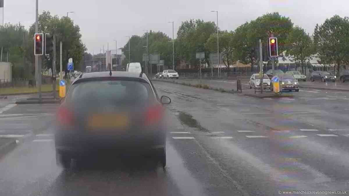 Footage shows dramatic police chase as stolen car races through red lights in Manchester