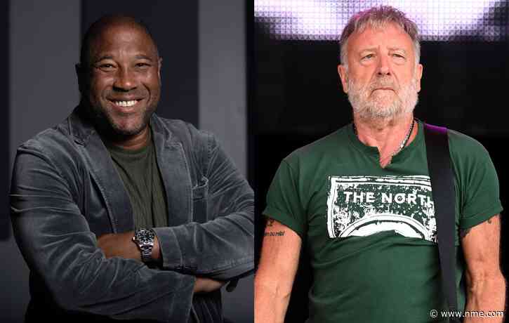 Watch John Barnes join Peter Hook to rap on New Order’s ‘World In Motion’ in Manchester