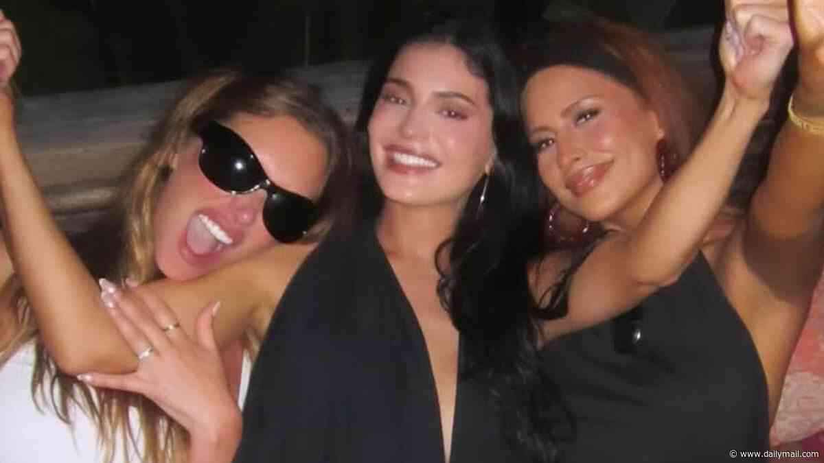Girl gone wild! Kylie Jenner is 'acting like a teen on spring break' as she parties in the tropics... but it's all a calculated move
