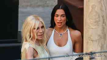Dua Lipa dances the night away with Donatella Versace at star-studded cocktail party in Sicily as she's rumoured to be wearing Italian designer's wedding gown
