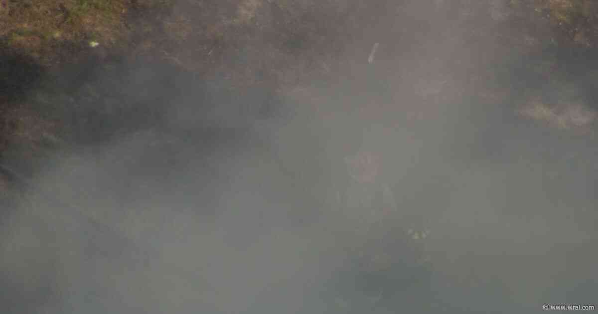 Crews investigate large outdoor fire in northern Wake County