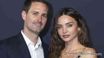 Miranda Kerr steps out in unreleased Dior gown worn by Monica Bellucci's daughter as she attends Paris party with husband Evan Spiegel
