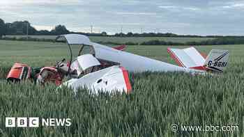 Two injured as small plane crashes in field