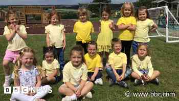 Children wear yellow in memory of drowned boy