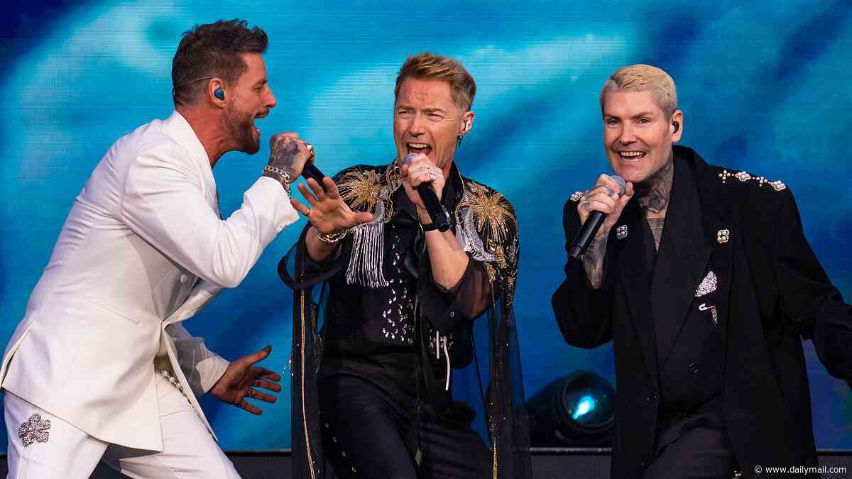 Mikey Graham says he's 'close to tears' during emotional speech at Boyzone's farewell gig - after sparking concerns by missing most of the concert