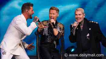 Mikey Graham says he's 'close to tears' during emotional speech at Boyzone's farewell gig - after sparking concerns by missing most of the concert
