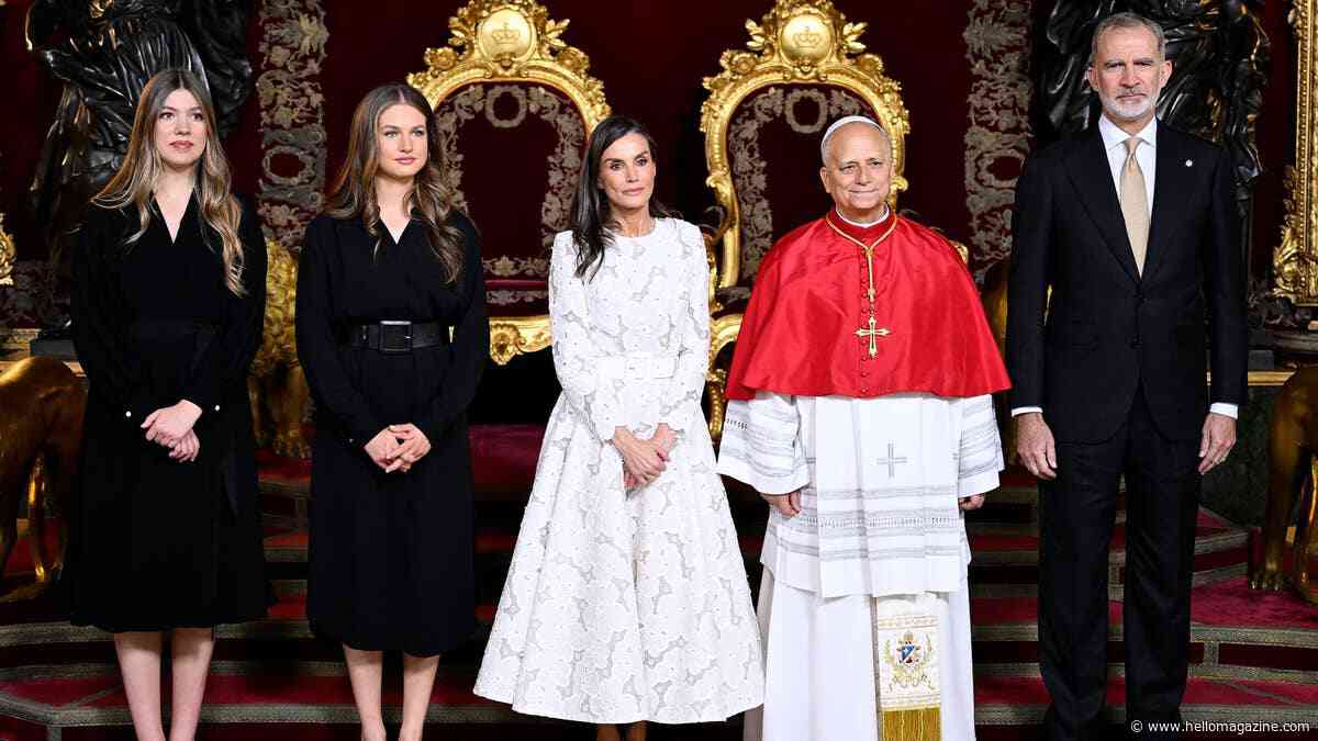 Queen Letizia performs rare double curtsy as she joins lookalike daughters Leonor and Sofia for historic meeting with the Pope