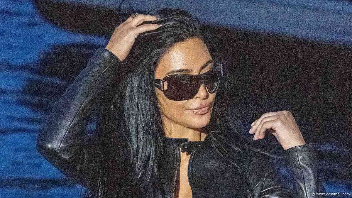 Kim Kardashian channels '90s leather-clad Victoria Beckham as she steps out at the Monaco Grand Prix to support boyfriend Lewis Hamilton