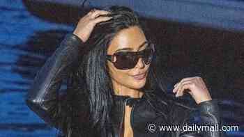 Kim Kardashian channels '90s leather-clad Victoria Beckham as she steps out at the Monaco Grand Prix to support boyfriend Lewis Hamilton