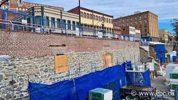 Artifacts of Victoria's past discovered by crews in sealed compartment beneath street