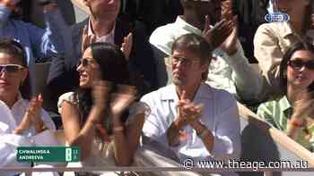 Brad Pitt claps along to Chwalinska's overhead slam