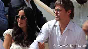 Brad Pitt, 62, and his girlfriend Ines de Ramon, 33, look loved-up as they watch the women's final at the French Open