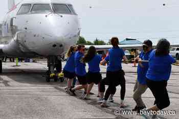 Pulling planes for the United Way
