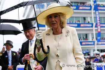 King and Queen defy downpours to revive royal tradition at Epsom Derby