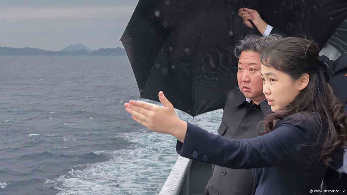Kim Jong Un parades teen successor daughter around naval destroyer as he reveals nuclear warship plans