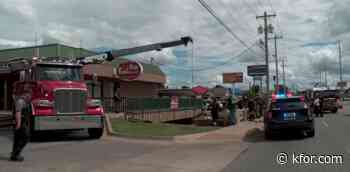 Two people hurt after car crashes into drainage area in NW Oklahoma City