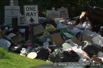 A broken trash compactor has left one Georgia neighborhood piled under garbage