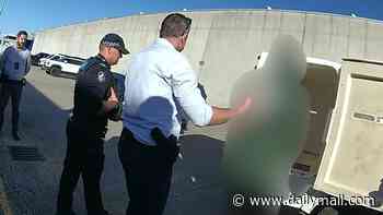 Dramatic moment cops arrest man after nine-week-old baby was left in intensive care with horrific injuries