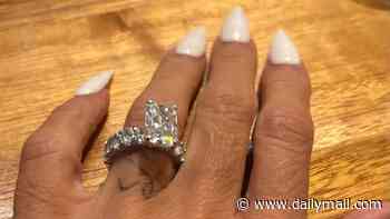 Katie Price declares her love for Lee Andrews and puts her wedding ring BACK ON days after her explosive meeting with husband's ex Dina Taji in Dubai