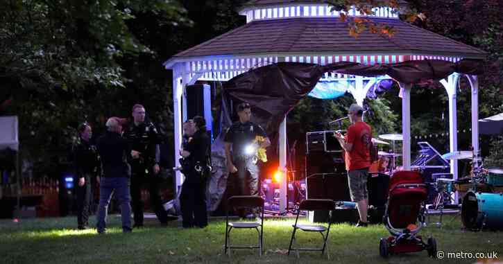 Police hunt for gunmen after 12 people shot at community festival
