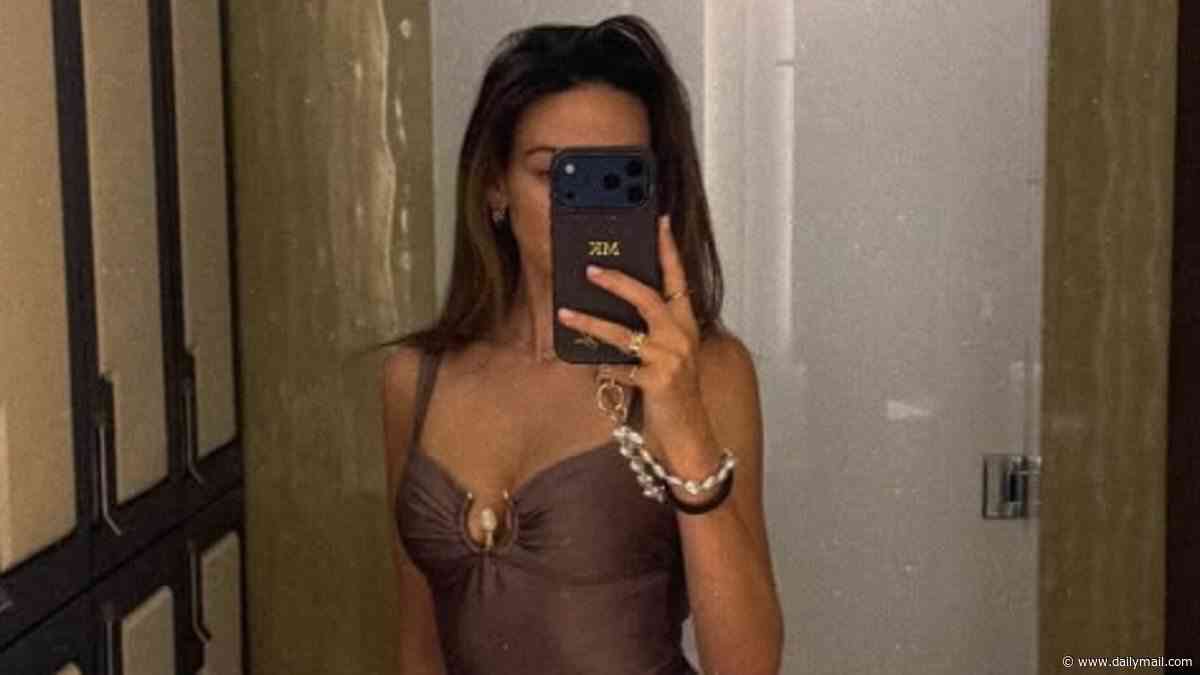 Michelle Keegan poses for a mirror selfie in a chic brown swimsuit as she enjoys lavish weekend at the £1k-a-night Corinthia Hotel in London