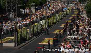 1 million people flood Madrid streets to see the pope's flower-carpeted procession