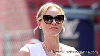 Princess Charlene is a Grecian goddess on the F1 grid in chic V-neck dress