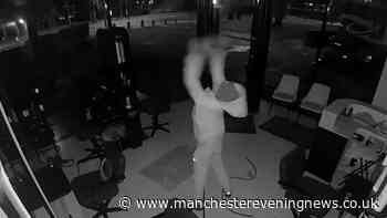 Disturbing CCTV shows 'man on rampage' as Salford salon torn up by hooded thug