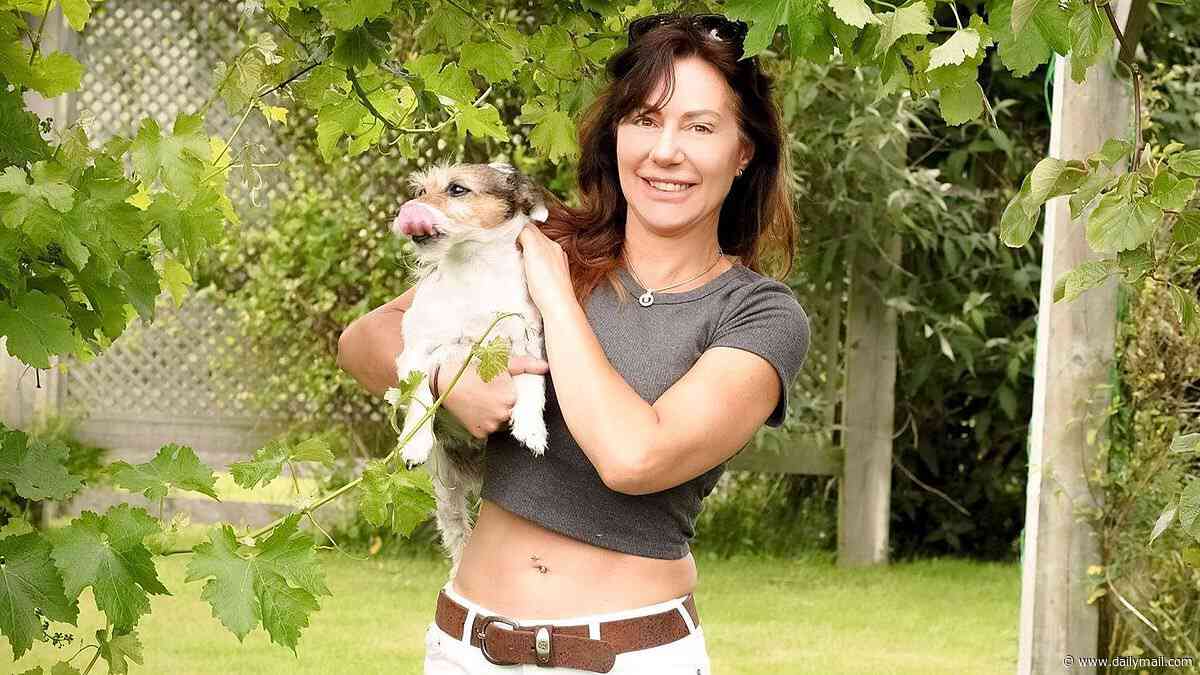Glamorous sheep farmer faces jail after secretly building second home inside barn on her 40-acre farm - despite paying council tax