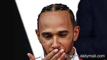 Lewis Hamilton blows kiss to Kim Kardashian from F1 podium… after 'rude' reality star is slammed for snubbing reporter