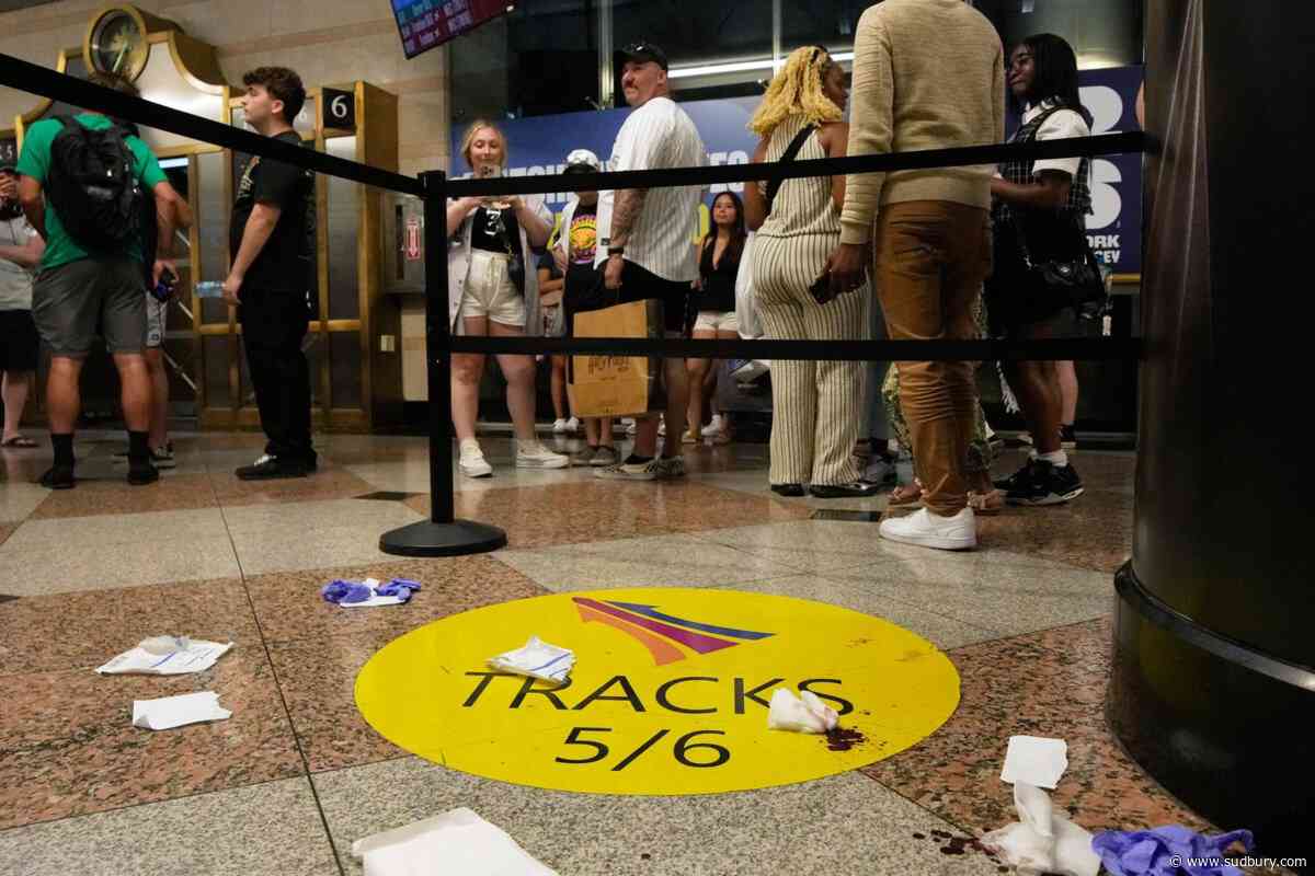 5 people hurt in stabbing at New York's Penn Station with a suspect in custody, authorities say