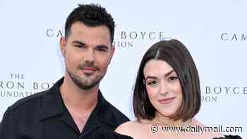 Twilight star Taylor Lautner and his pregnant wife Tay thrill fans with live gender reveal on social media: 'Our little secret is now yours'