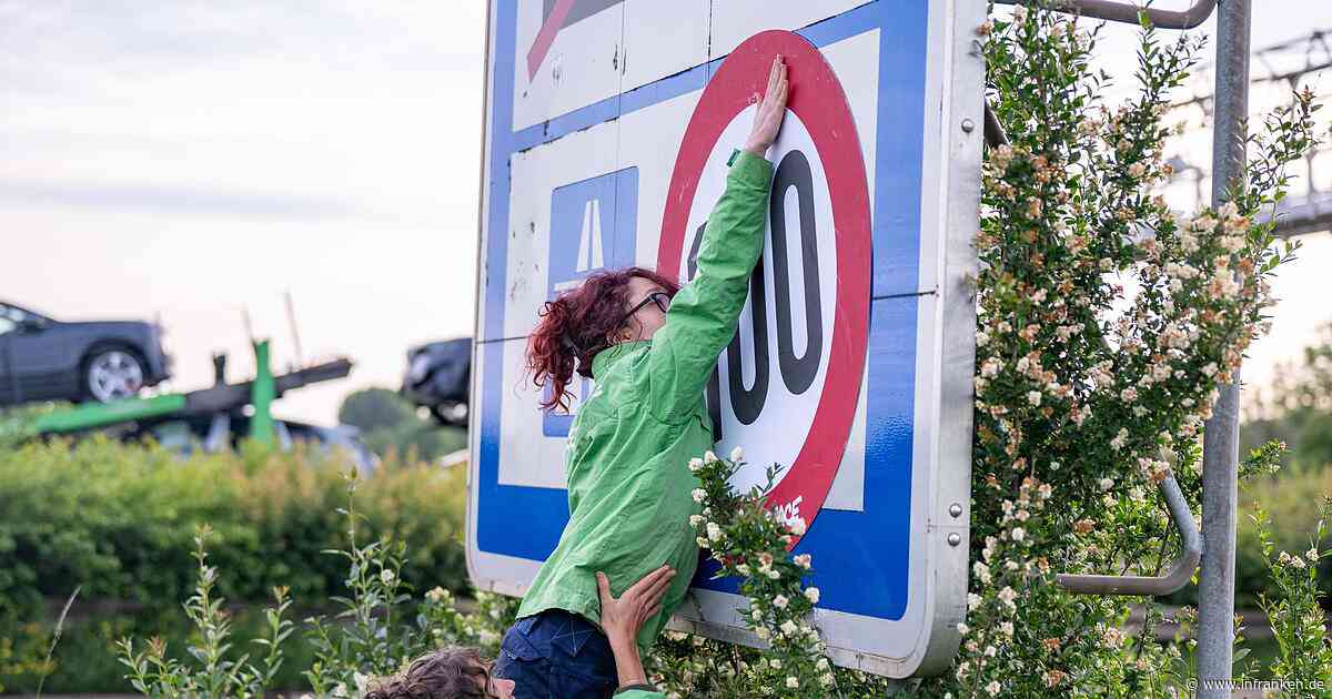 Greenpeace bringt Tempo-100-Schilder an Autobahnen an