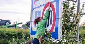 Greenpeace bringt Tempo-100-Schilder an Autobahnen an