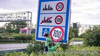 Greenpeace bringt Tempo-100-Schilder an Autobahnen an