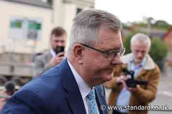 Jeffrey Donaldson arrives at court as sex offences trial enters third week