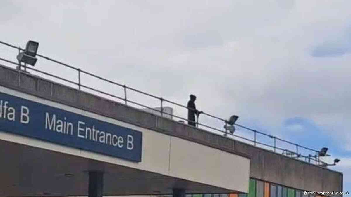 Emergency services called to Welsh hospital over hooded man on roof